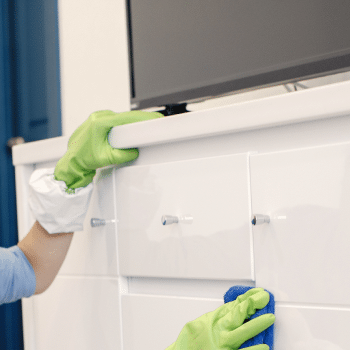 4250530b woman with sponge rubber gloves cleaning house 2.png